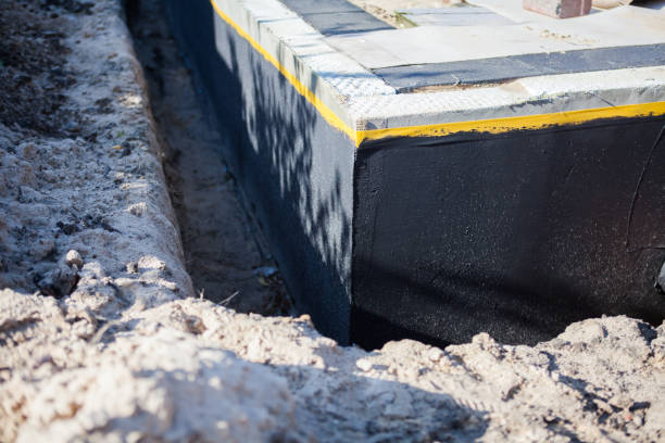 Professional Wet Basement Repair technician working in Junction City, KS
